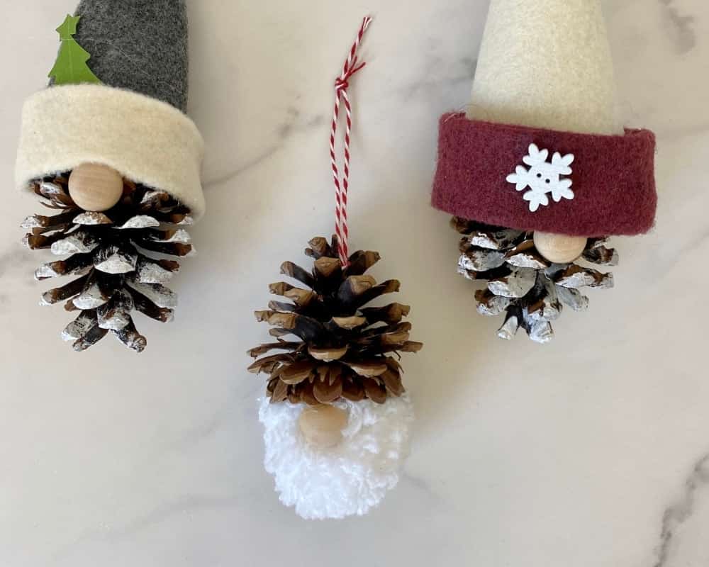 DIY Pinecone Christmas Gnomes by hootshack