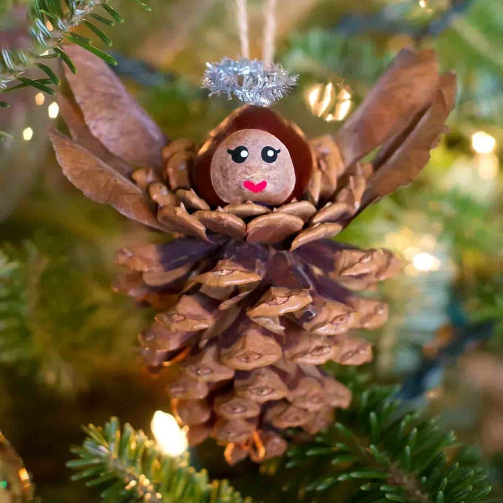 how to make an angel christmas ornament using pine cones.